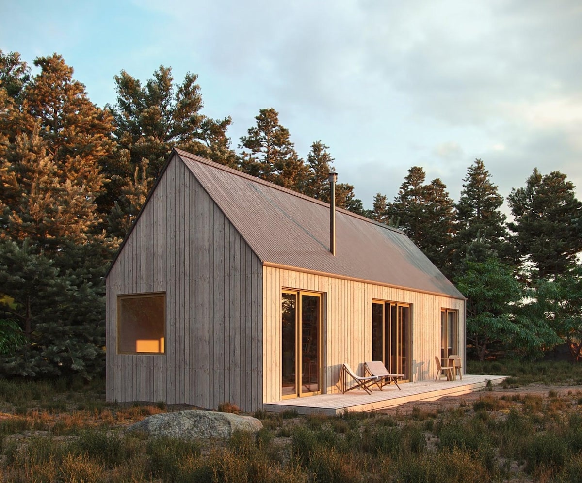 Burnished slate metal roof: Modern Loft Barnhouse with a small porch